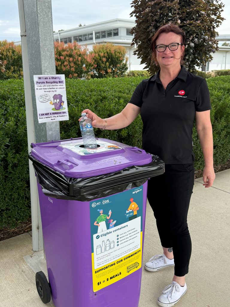 Canberra Park Employee Using ACT CDS Bin